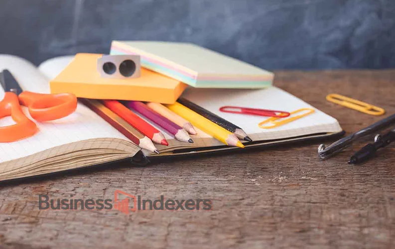 School supplies like pencils and scissors, which are popular things to sell at school, neatly arranged on a desk.